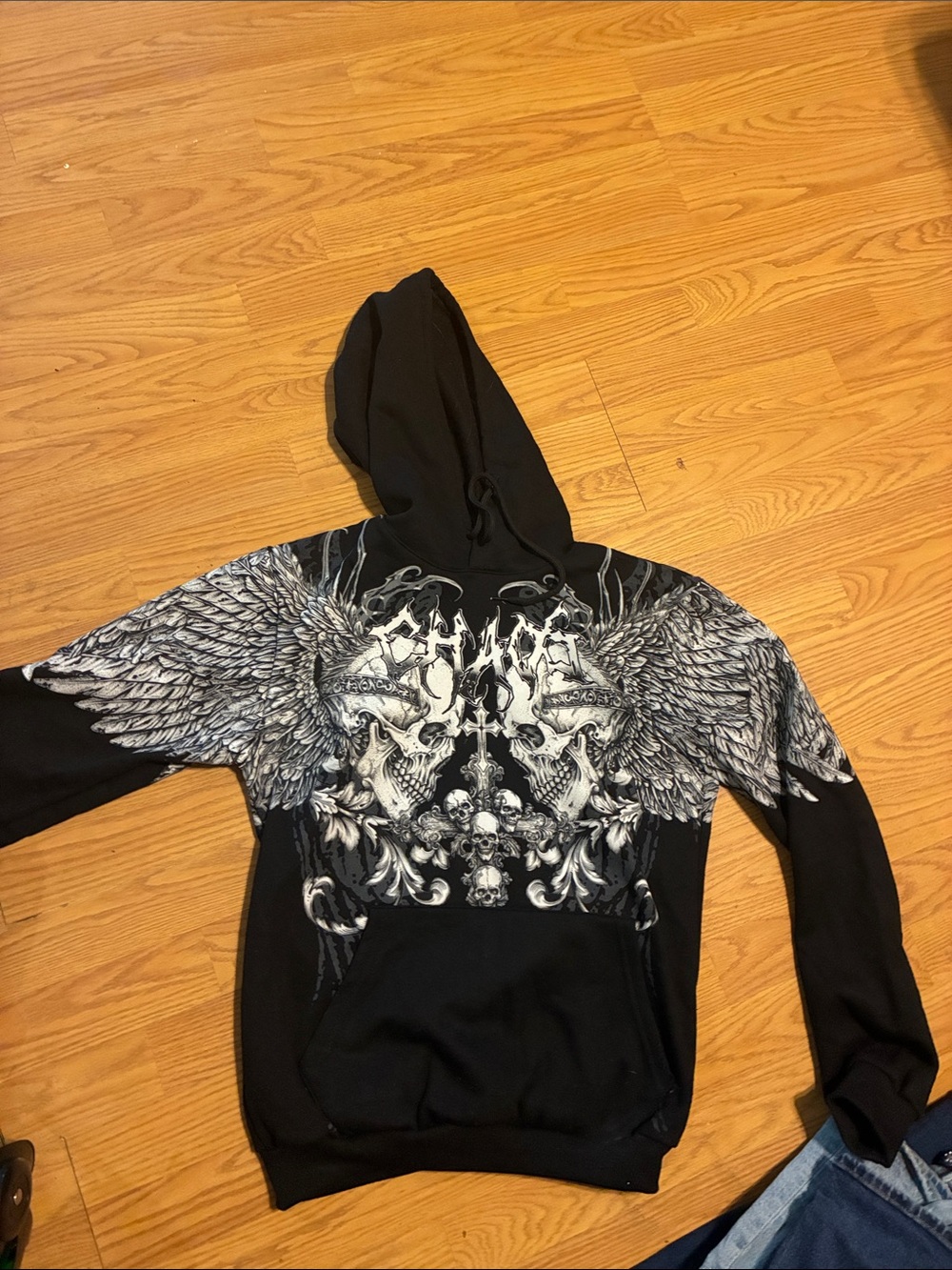 Salvage Black Crewneck Hoodie with Winged Skull Graphic